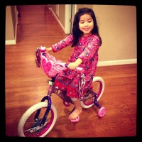 Clover on her Big Girl Princess Bike - we got her for her birthday as a surprise...